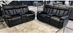 Black 2 + 2 Leathaire Manual Recliners With Cup Holders And Storage Ex-Display Showroom Model 51047